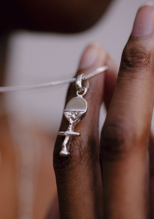 Akwaaba doll necklace