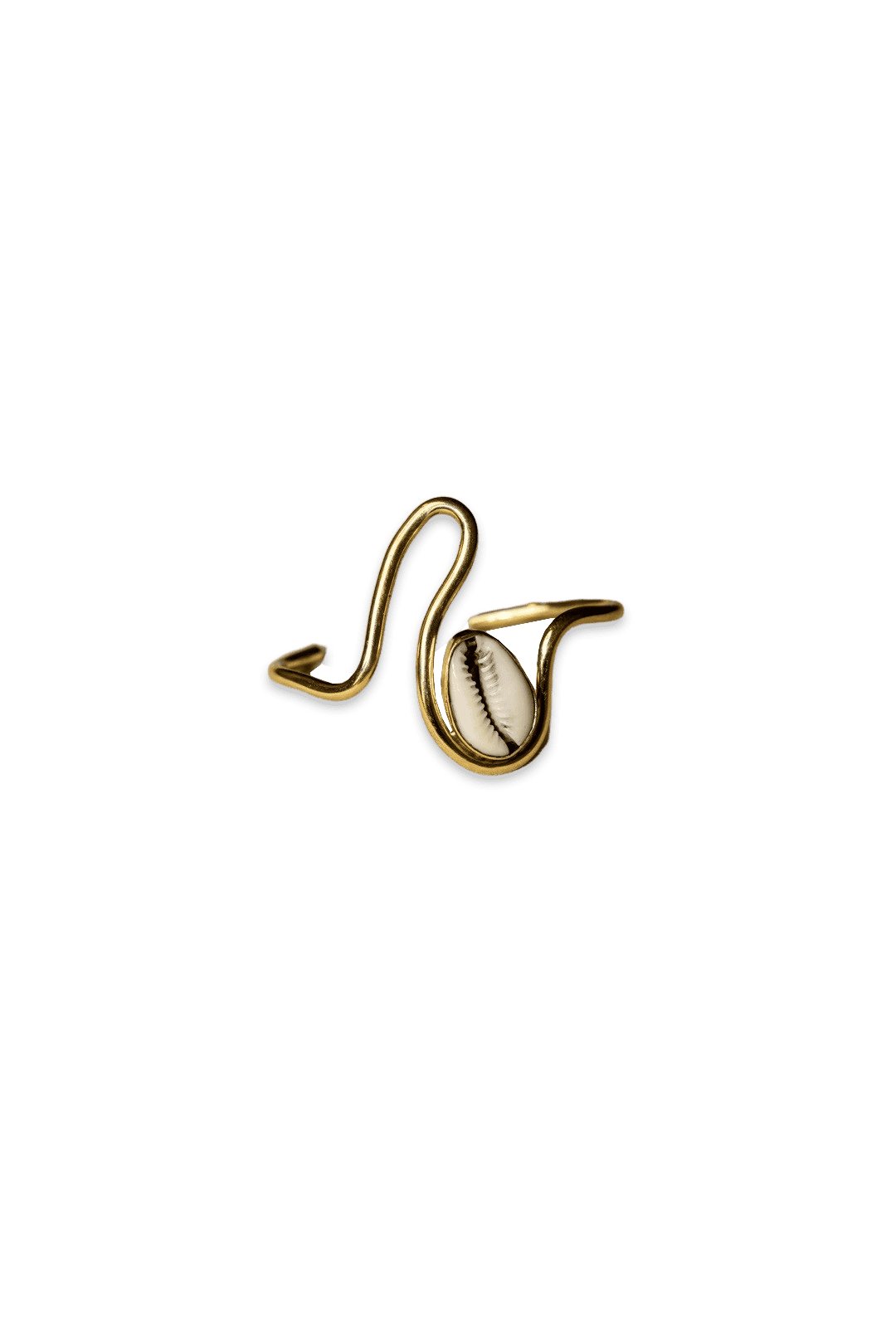 A gold-colored brass cuff bracelet with a cowrie shell design, representing the Wimbi cowrie cuff.